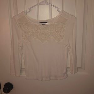 White shirt with 3/4 sleeve and lacing on top